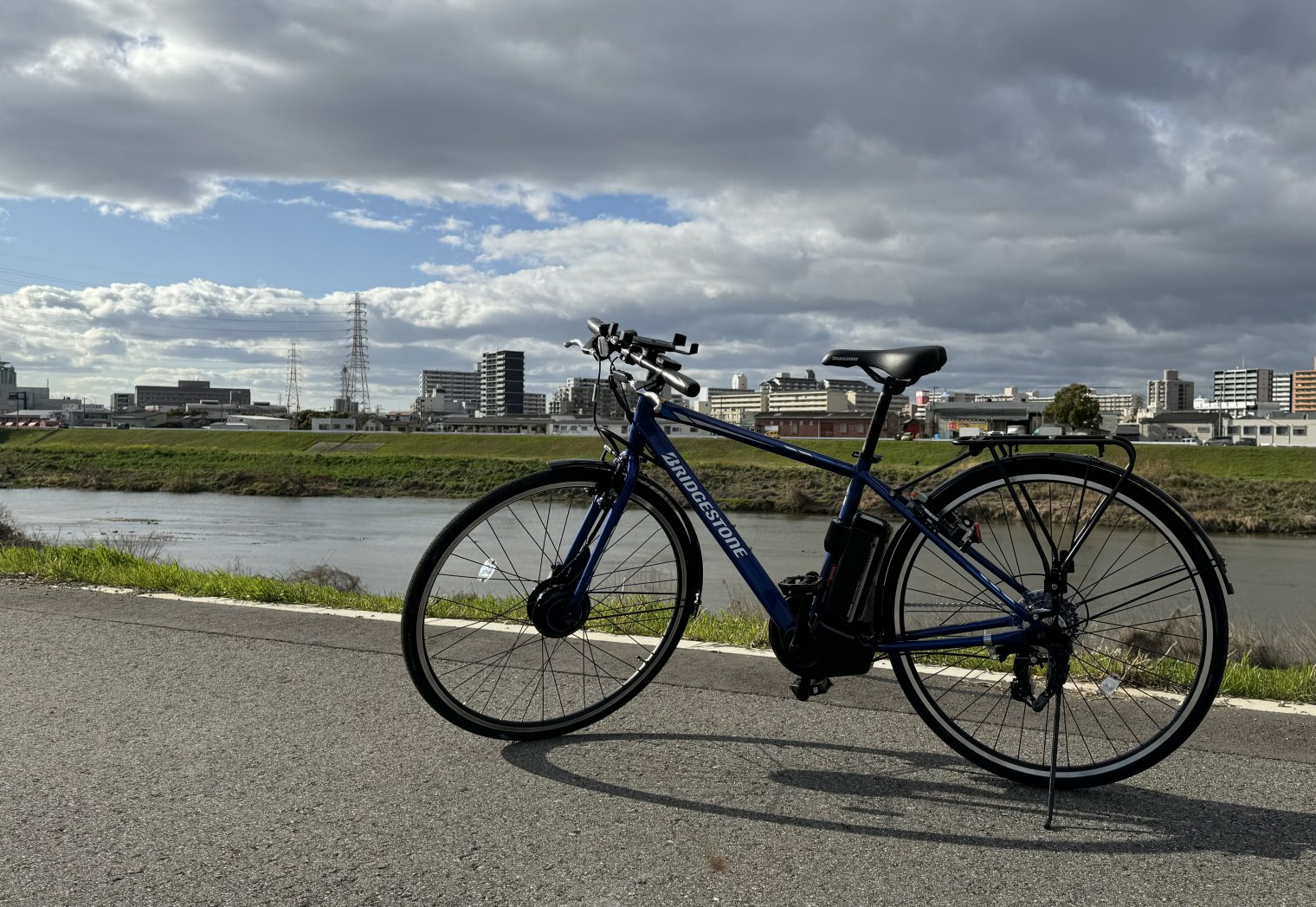 Bicycle parked in front of Yamato River