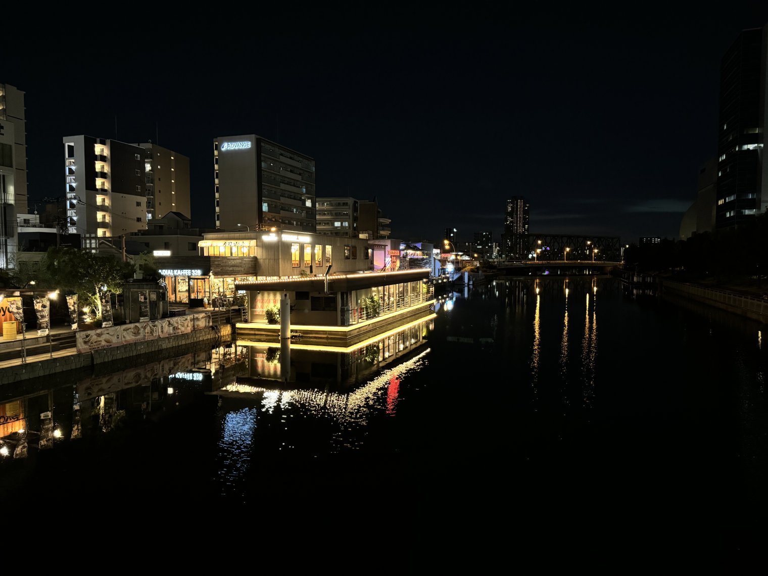 View from bridge overlooking a channel in Taisho, Osaka. Tugboat Taisho can be seen prominently. 