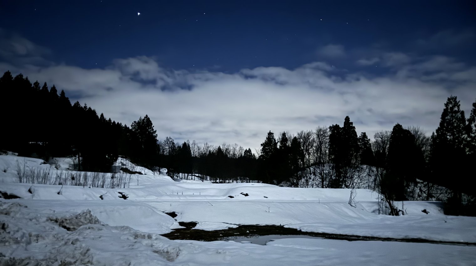 A snowy landscape under the stars in Joetsu